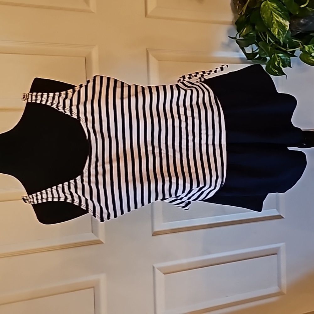 Navy blue and white stripped bathing suit with skirt.